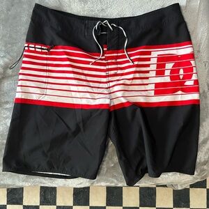 DC Men's Black and Red Swim Shorts made with no elastic waist size 38